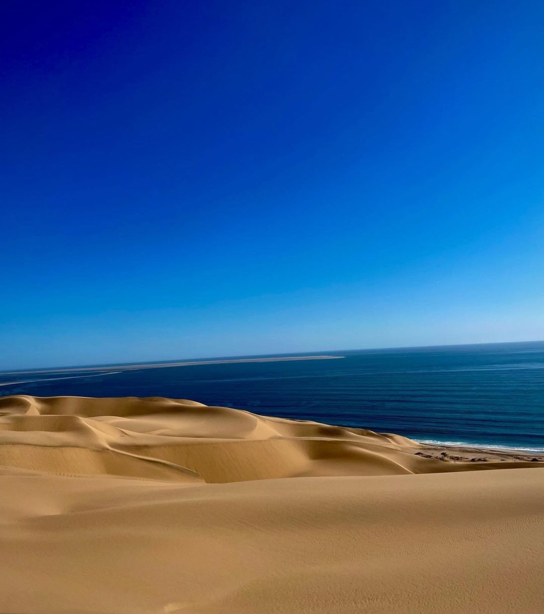 Sandwich Harbour dunes meeting the Atlantic Ocean